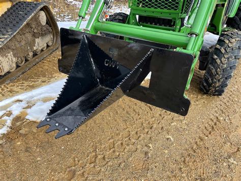 stump digger for skid steer|best compact tractor stump bucket.